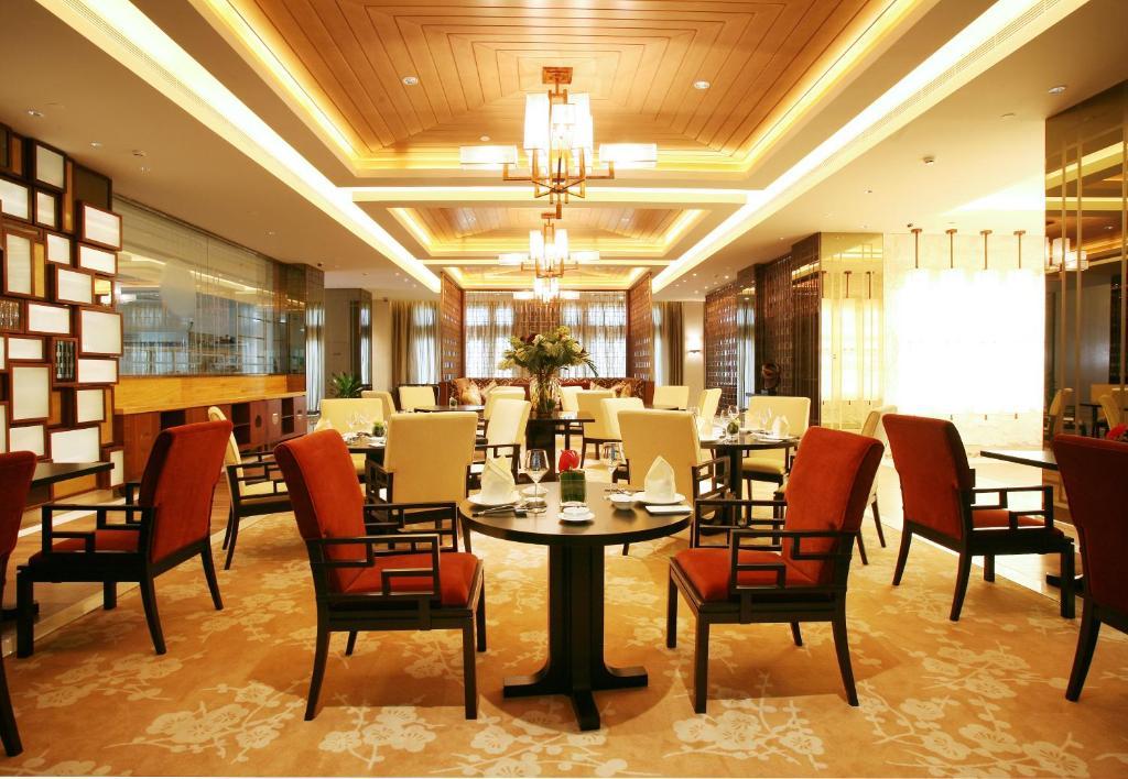 Landison Green Town Hotel Xinchang Exterior photo